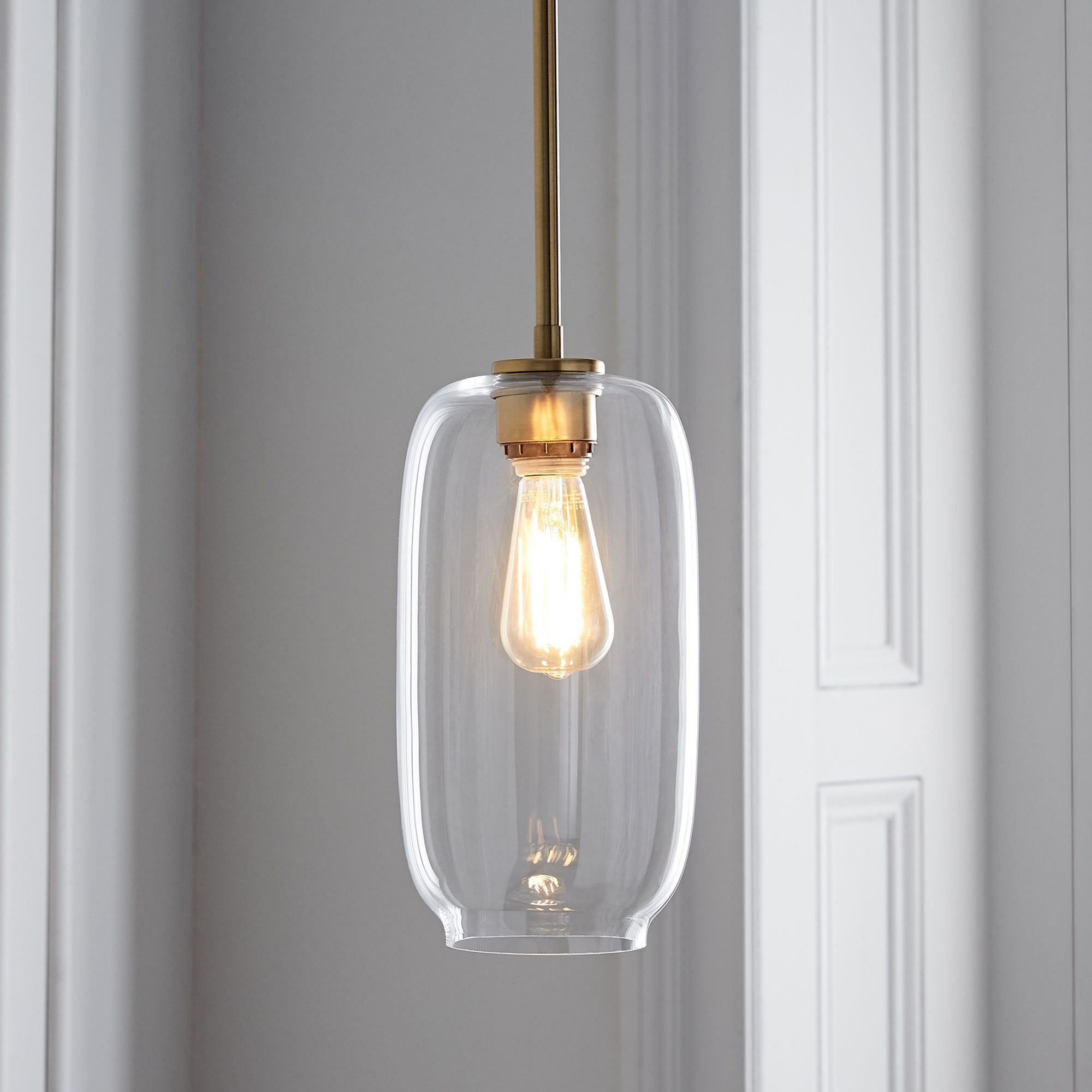 Sculptural Glass Pebble Pendant, 6", Clear Shade, Brass Canopy