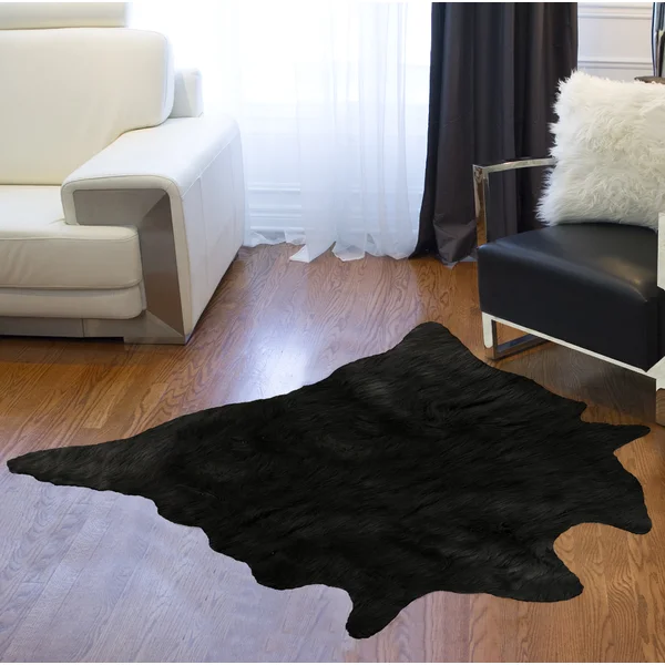 Faux Cowhide Area Rug In Black