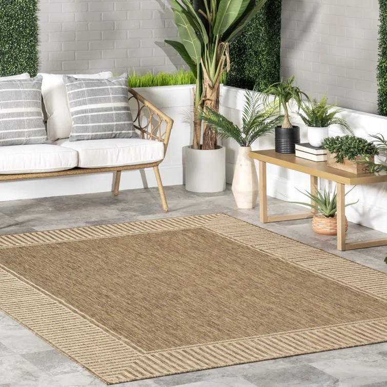Gracie Oaks Alegre Bordered Power Loomed Tan Indooroutdoor Rug